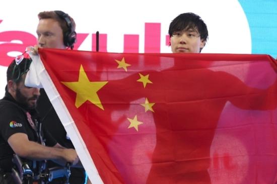 China adds 2 silvers, Marchand sets 200m individual medley world record at Singapore World Championships